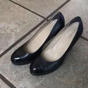 Tarahi black leather heels